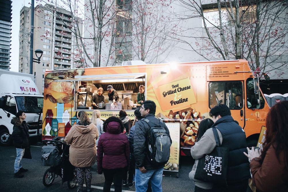 Customers wait at food truck